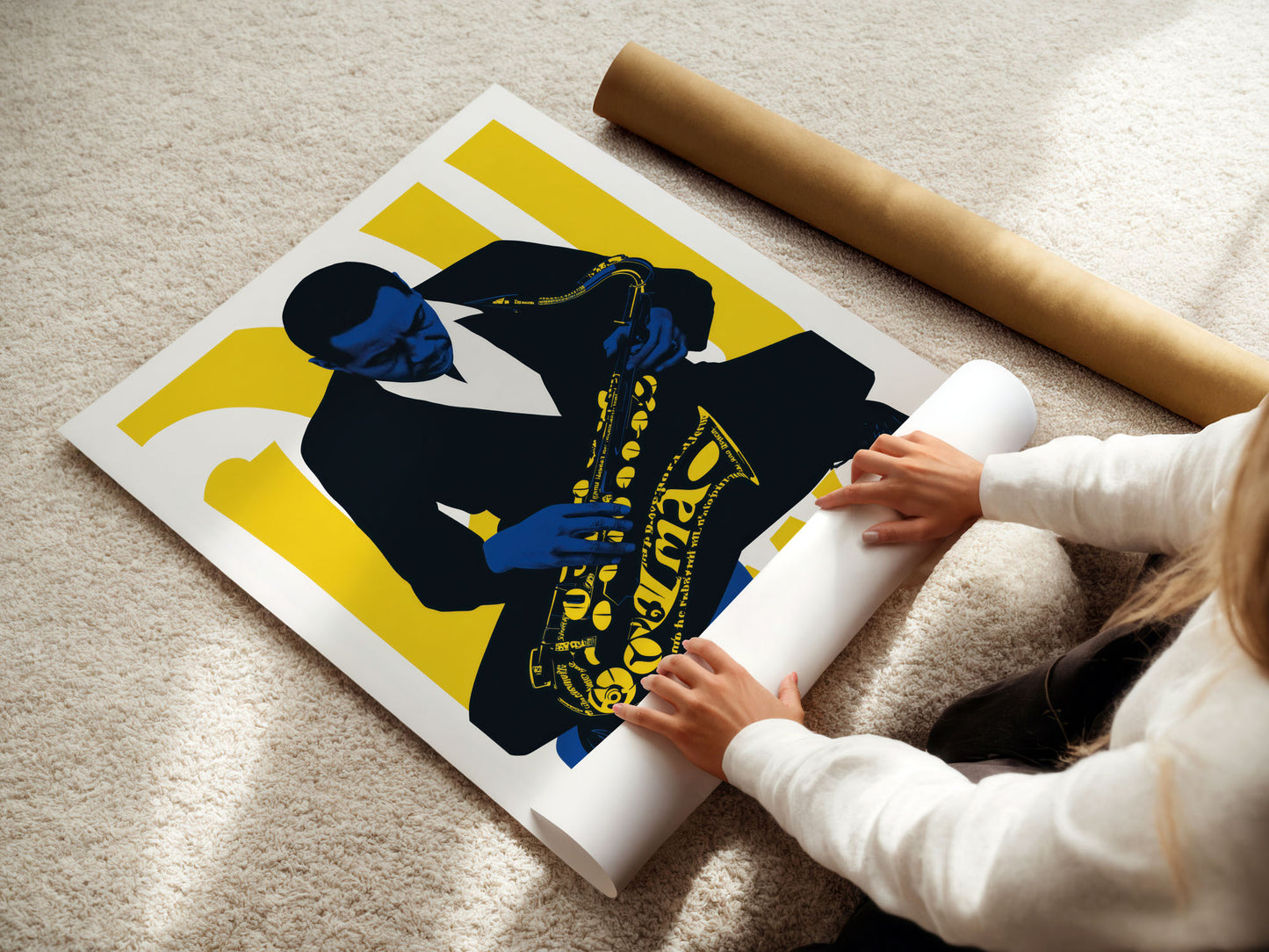 young girl Person unrolling a large poster of a stylized figure with a yellow background on a carpeted floor.