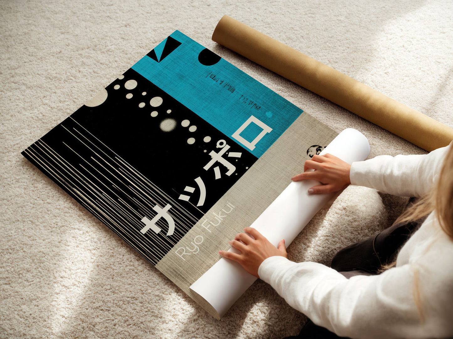 Person unrolling a large roll of paper with a branded mat in the foreground.
