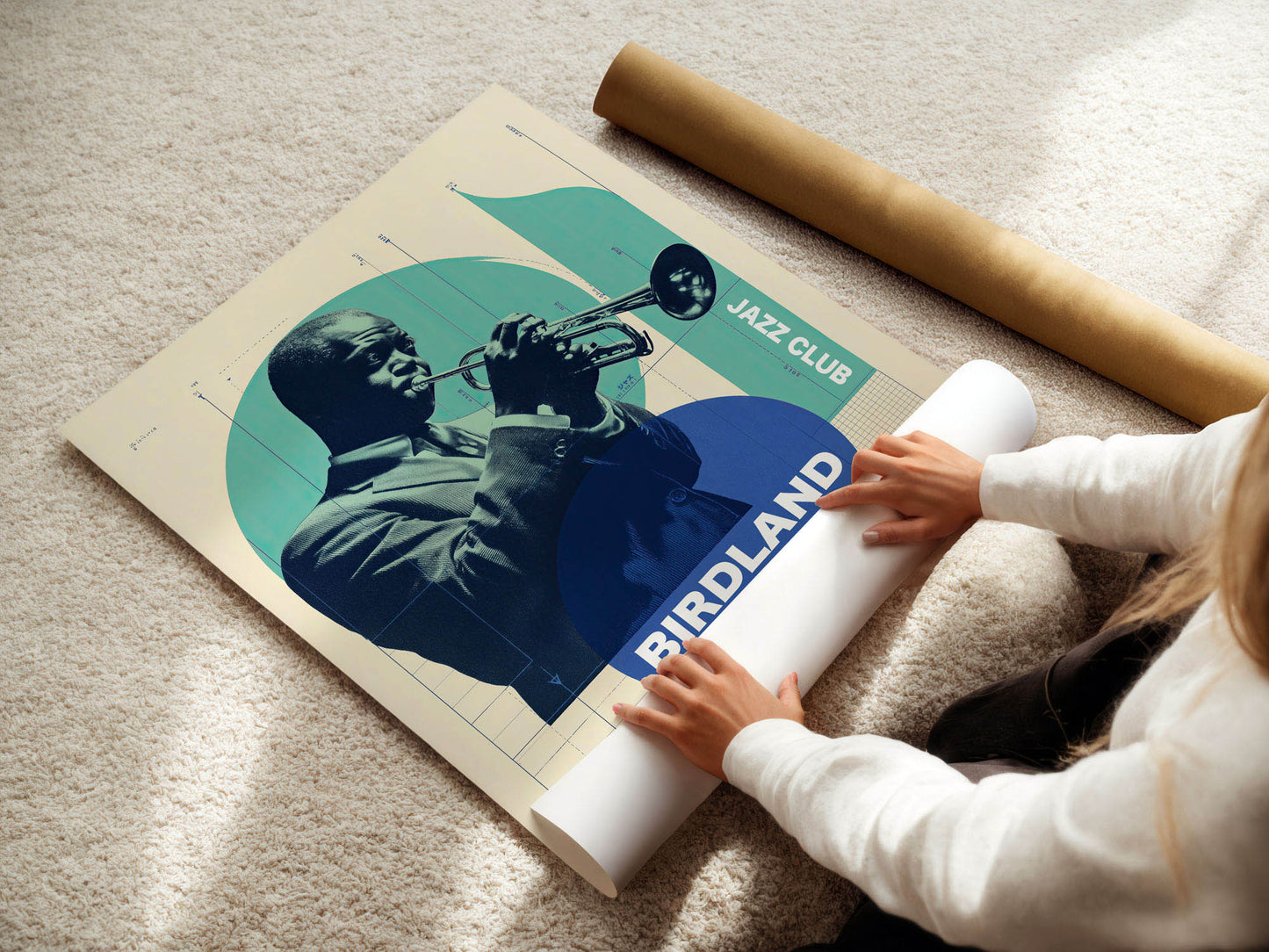 Person unrolling a 'Birdland Jazz Club' poster on a carpeted floor