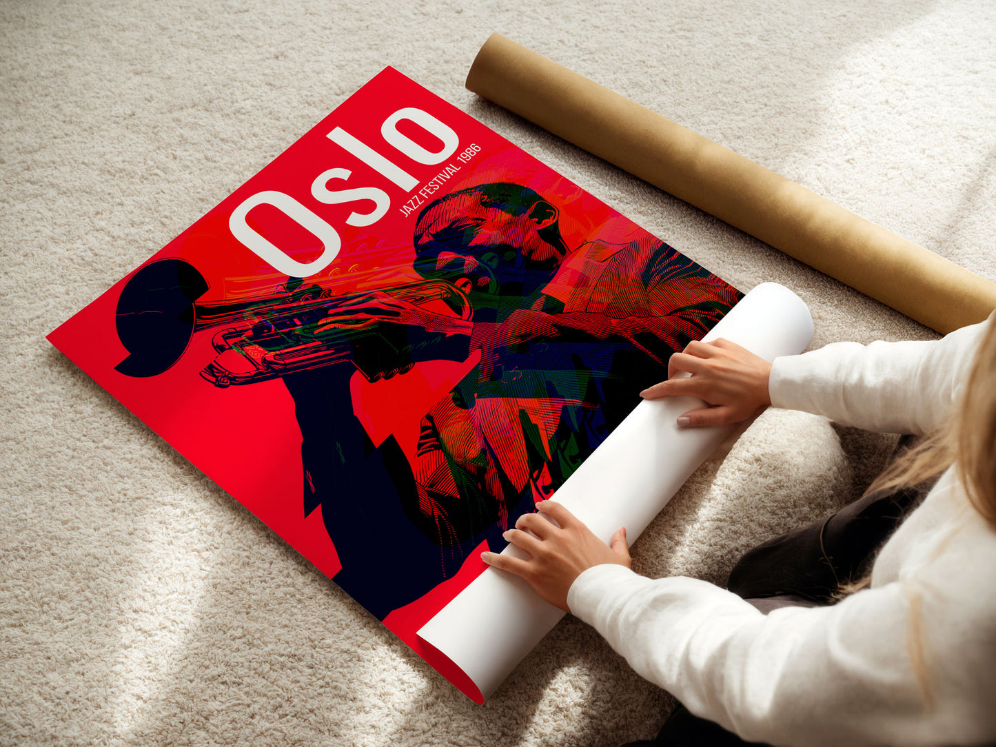 Person unrolling a large poster of 'Oslo' on a carpeted floor