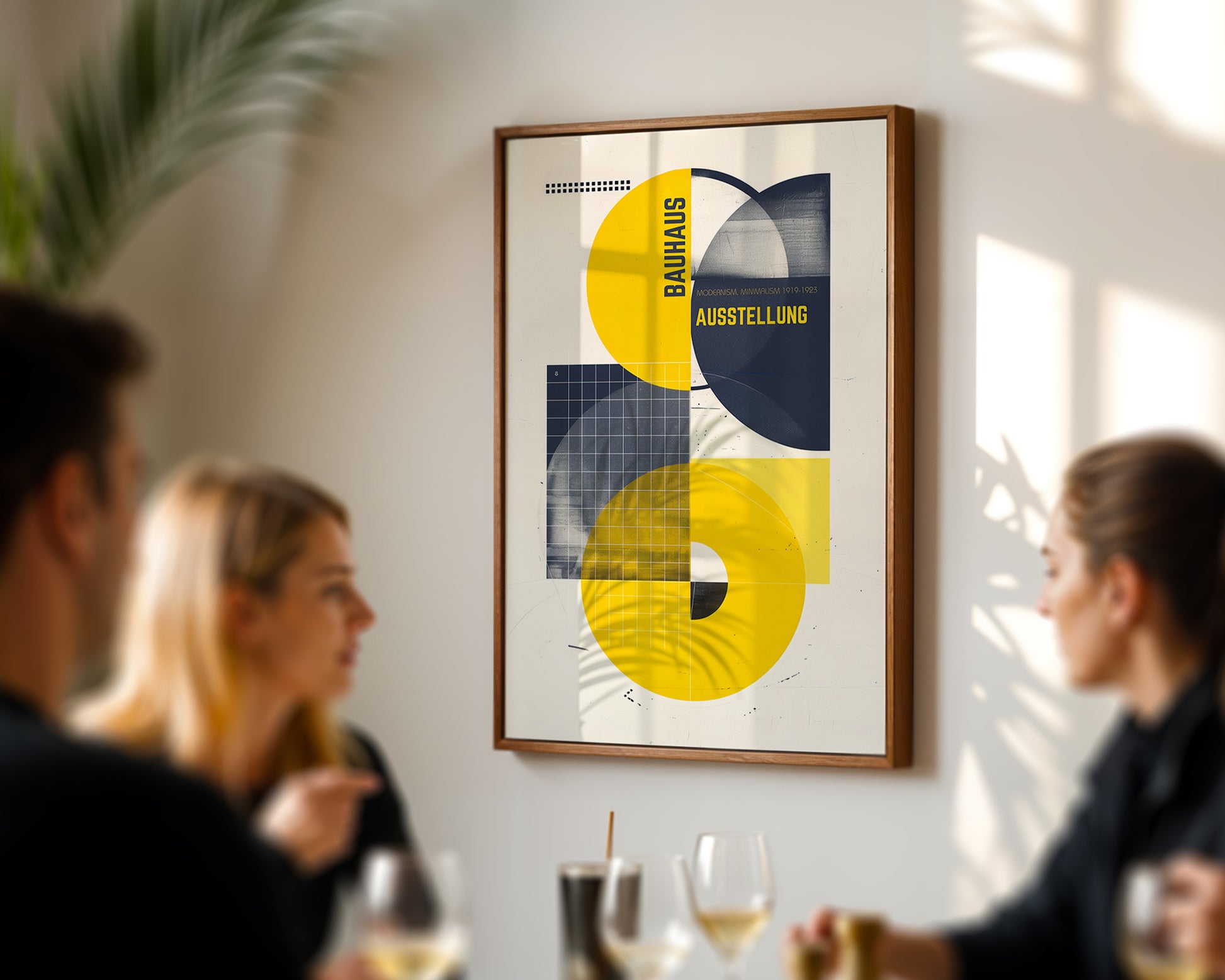 Framed abstract art print on a wall with people in the foreground