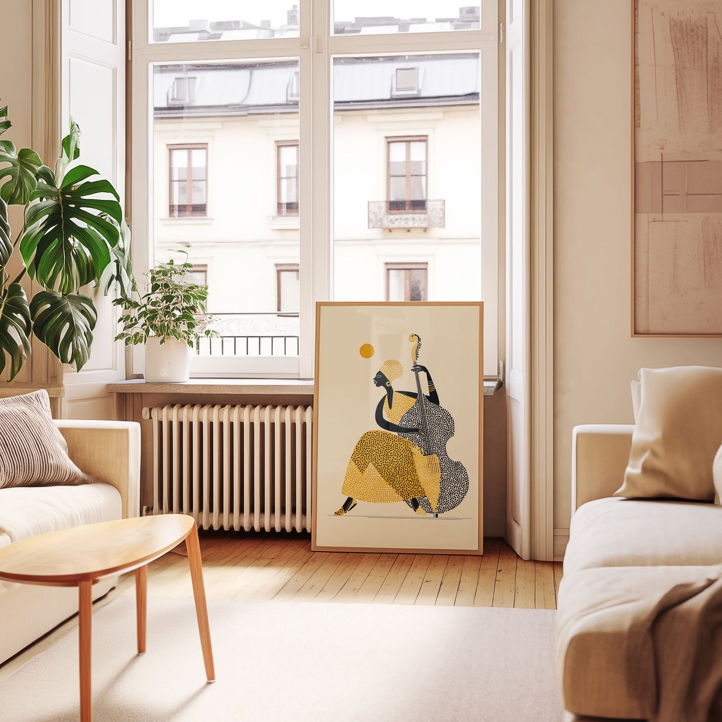 Modern living room with a large window, artwork on the wall, and a sofa.