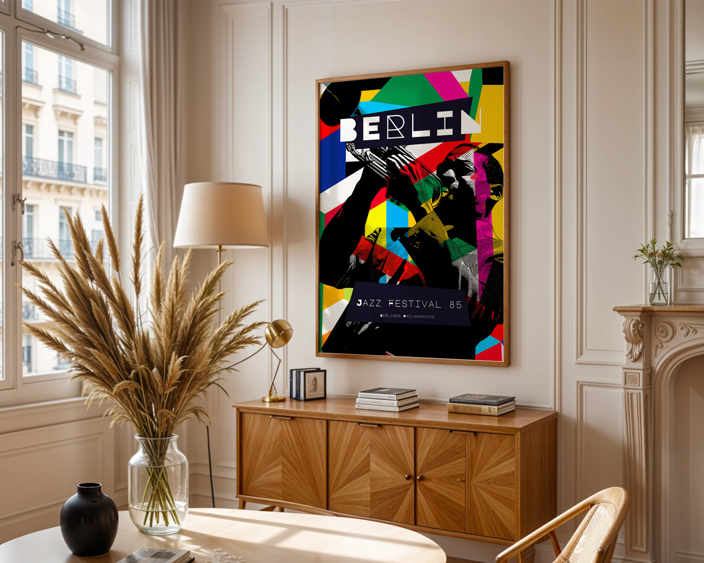 Living room with a colorful 'BERLIN' poster on the wall, wooden cabinet, and decorative items.