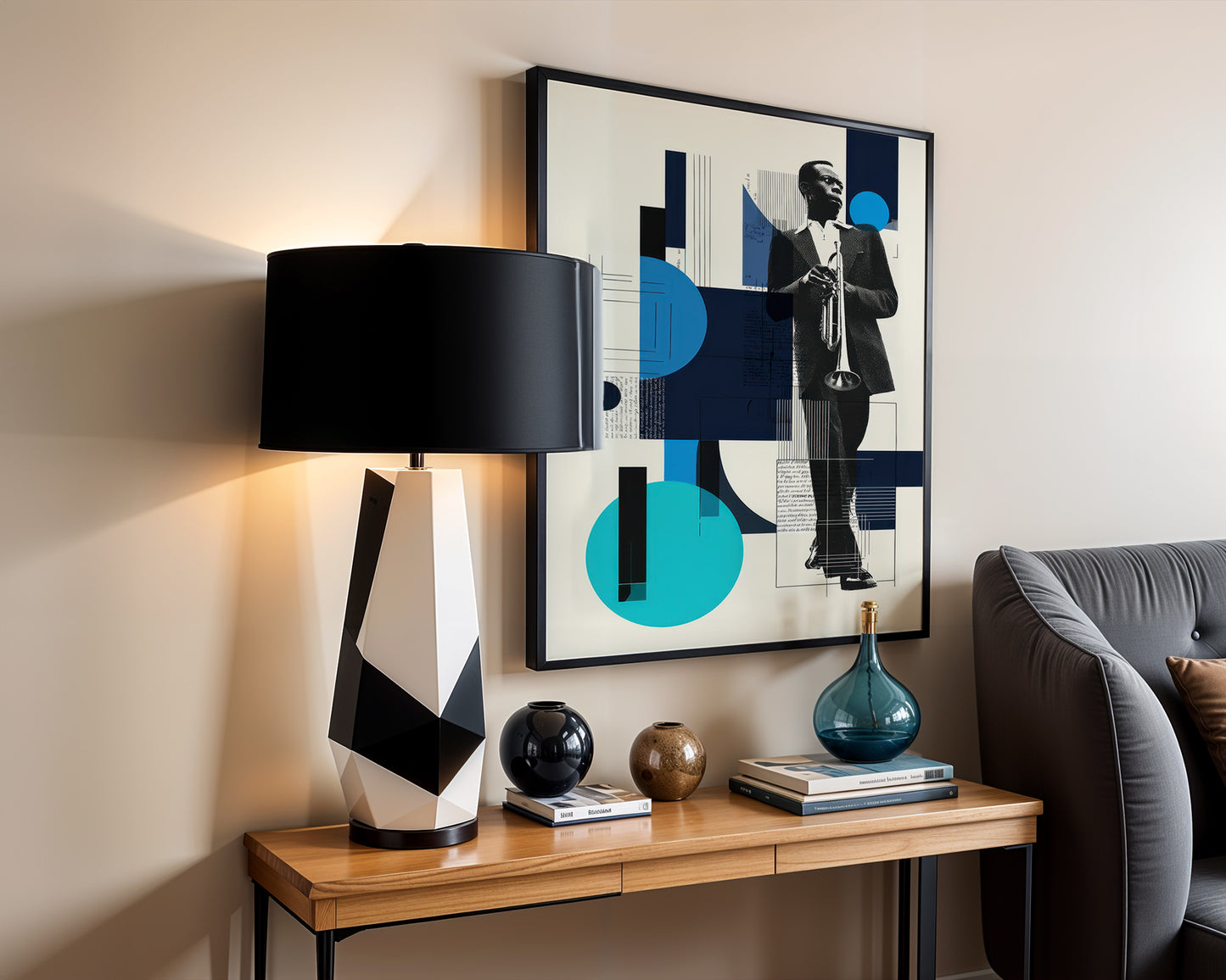 Modern interior with a lamp, framed abstract art, and decorative items on a wooden console table.