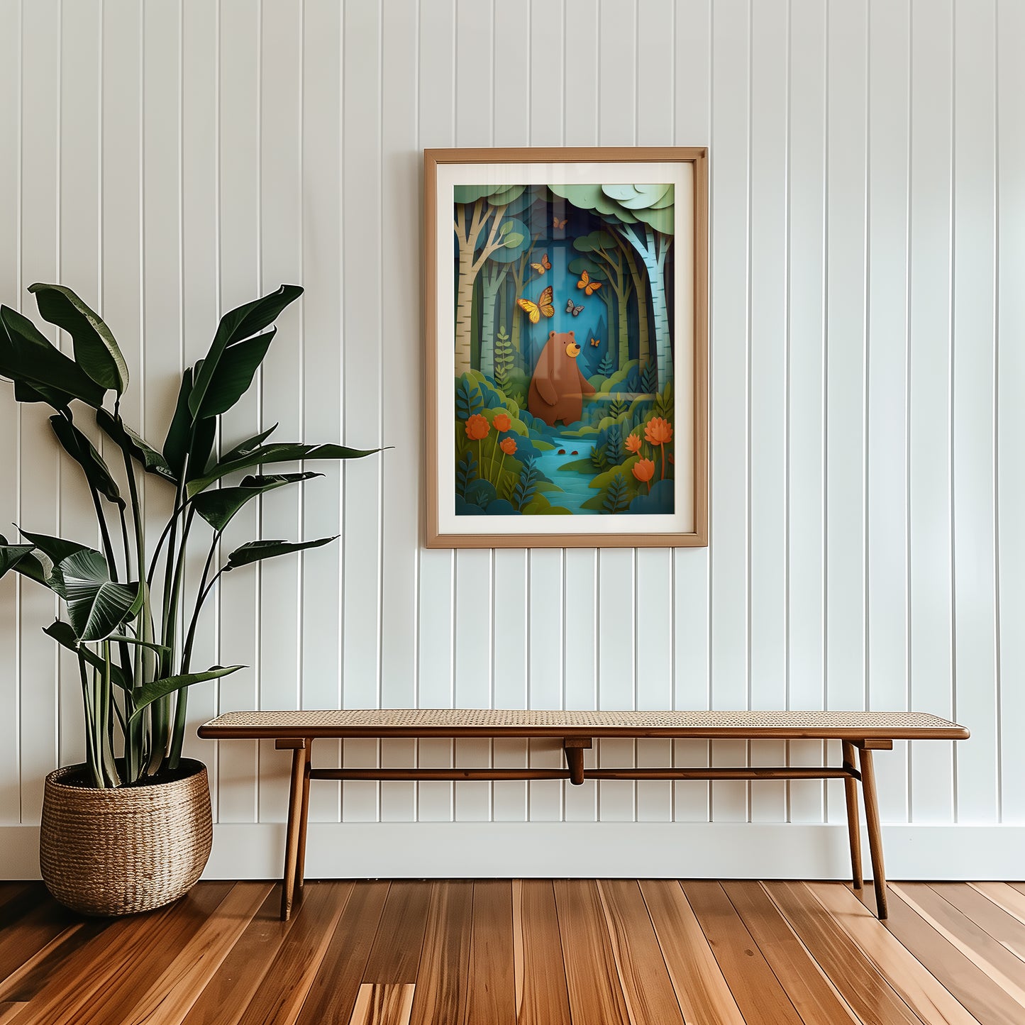 Framed artwork of a bear in a forest scene on a wall above a wooden bench with a plant beside it.