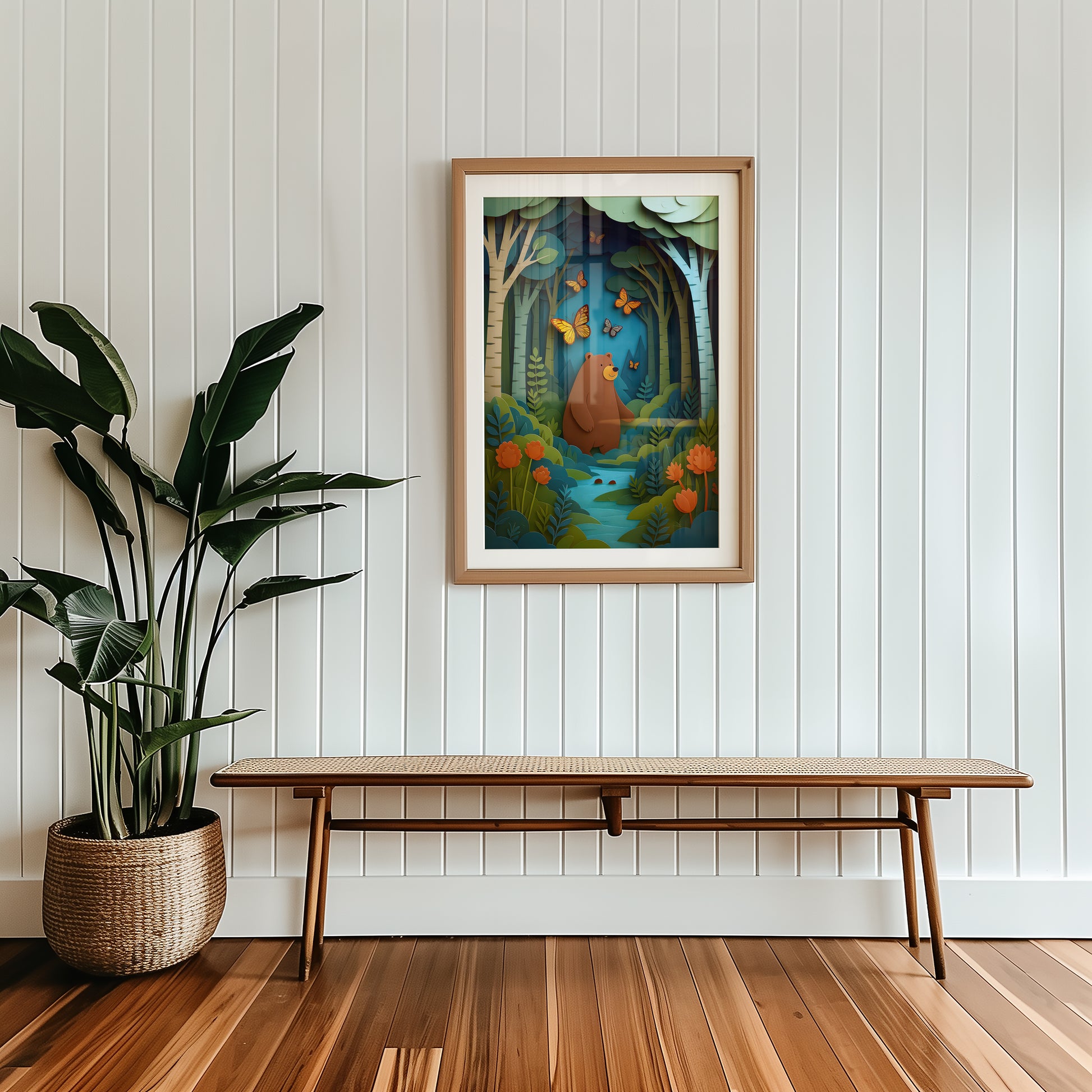 Framed artwork of a bear in a forest scene on a wall above a wooden bench with a plant beside it.