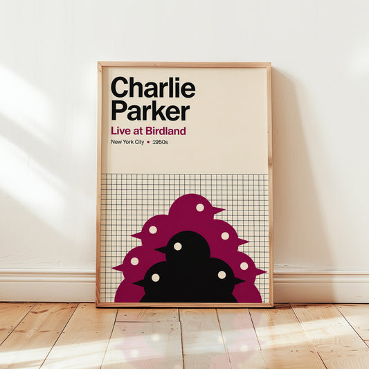 Framed poster of Charlie Parker with a design of birds on a grid background, placed on a wooden floor.