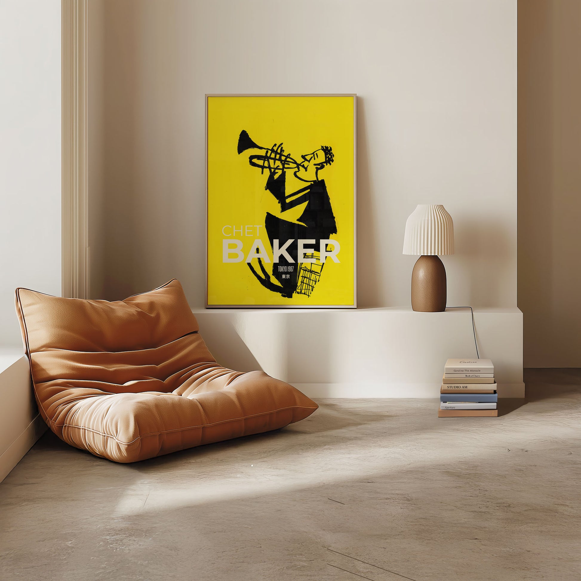 Modern interior with a brown cushioned chair, yellow poster, and lamp.
