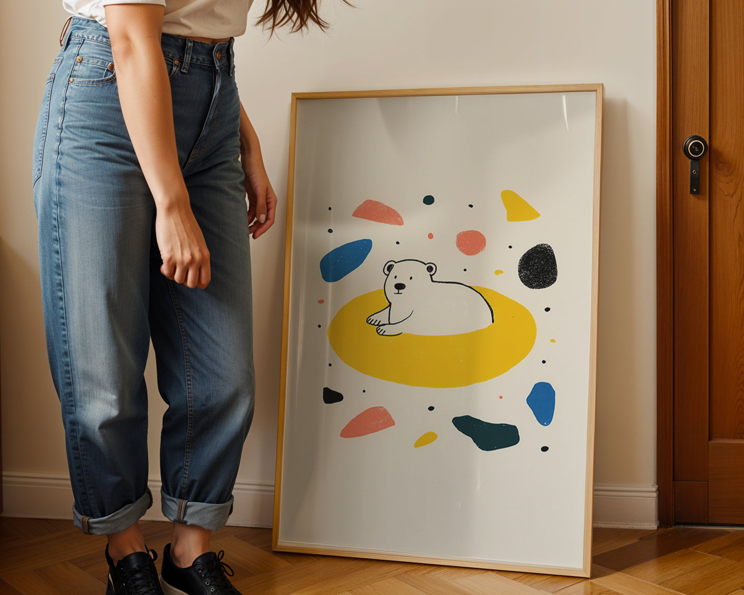 Close-up of minimalist polar bear illustration with colourful abstract shapes