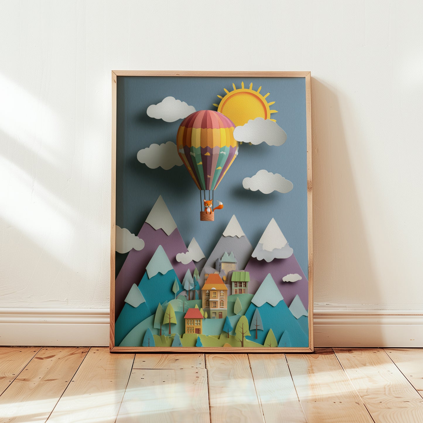 Colorful hot air balloon nursery wall art print featuring layered paper-cut mountains and village illustration displayed in wooden frame.