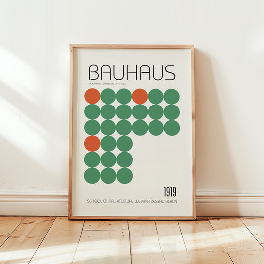 Bauhaus 1919 modernist poster print featuring a grid of green circles with bold orange accent dots on a cream background and minimalist typography.