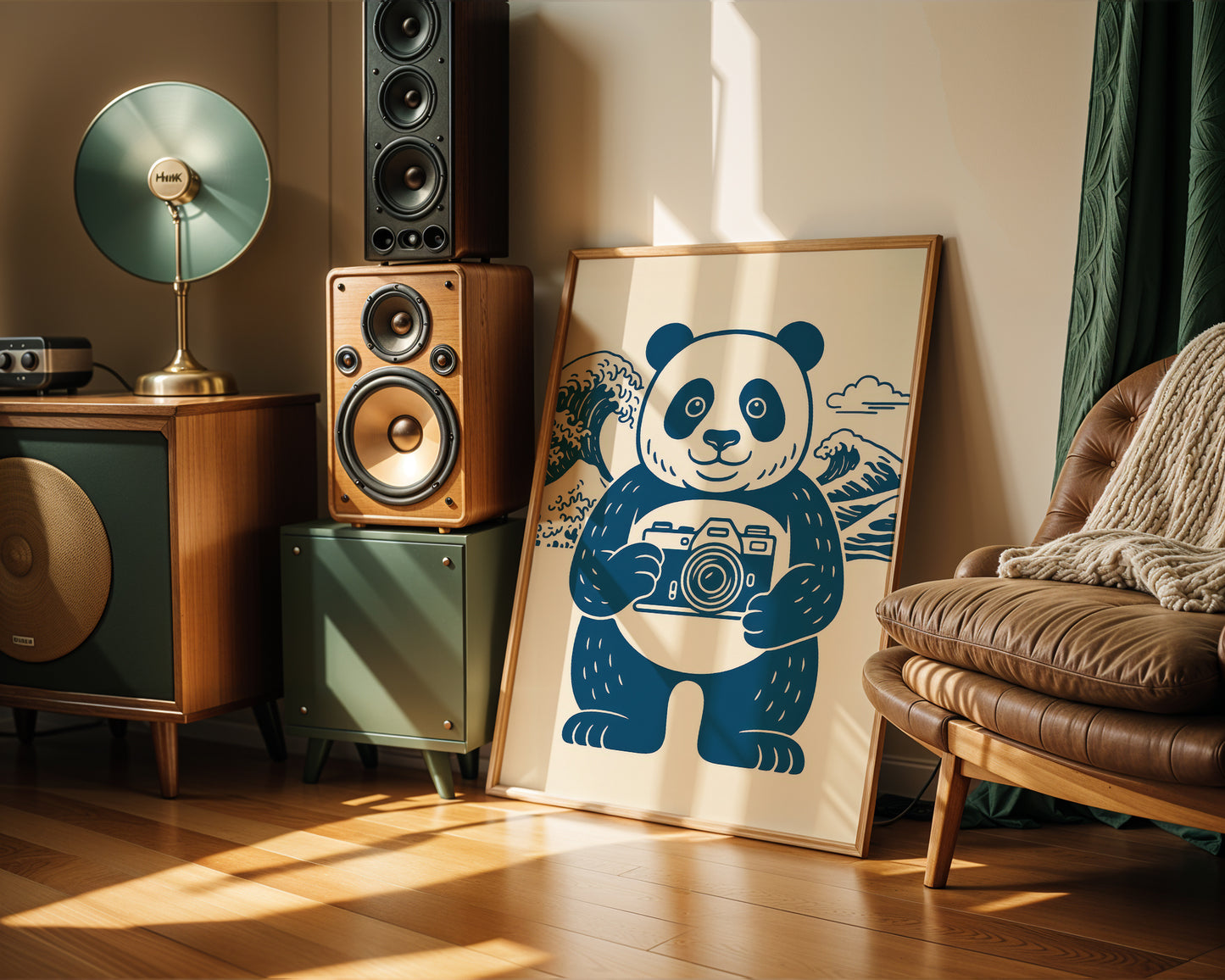 Room interior with speakers, a lamp, and a poster of a panda holding a camera.