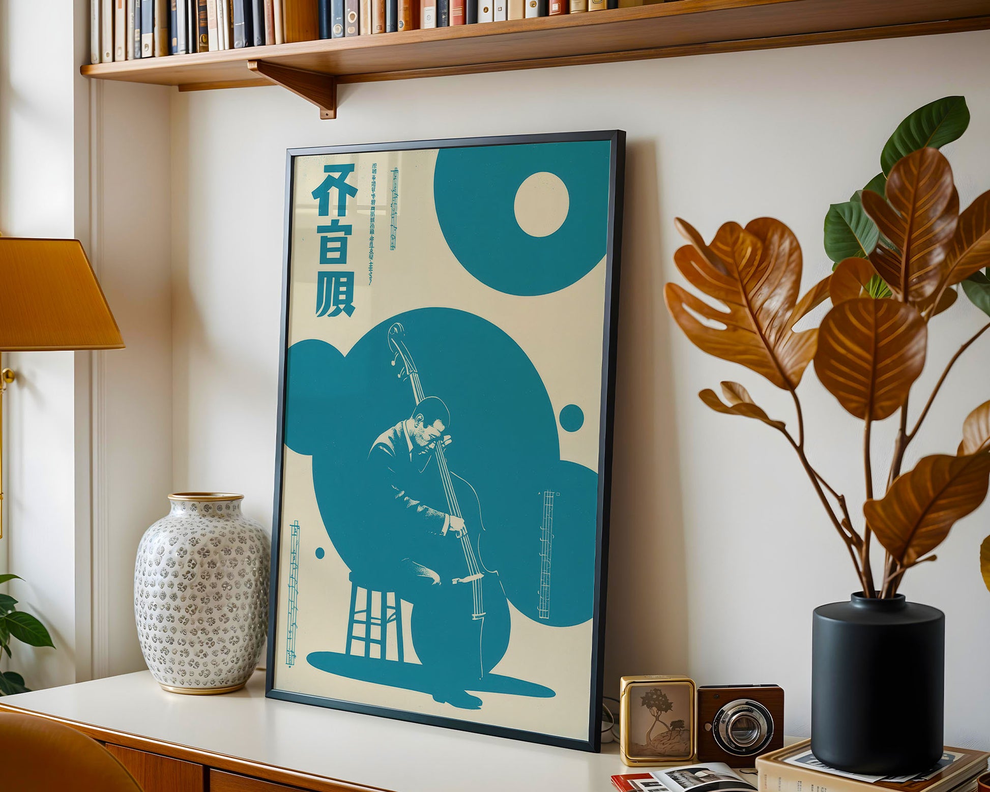 Framed Japanese Jazz artwork with abstract design and text on a wall above a desk with decorative items.