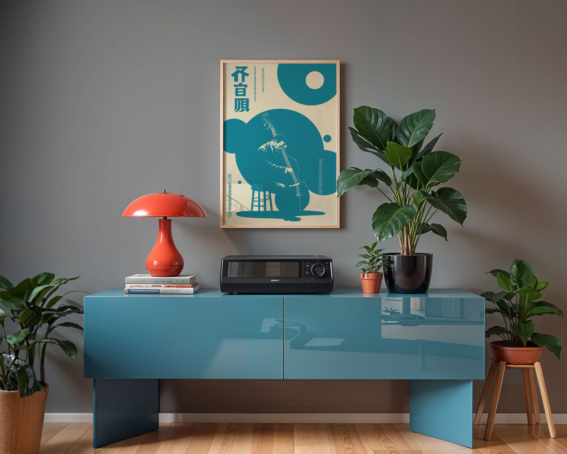 Modern interior with a blue console table, red lamp, and decorative items against a gray wall.
