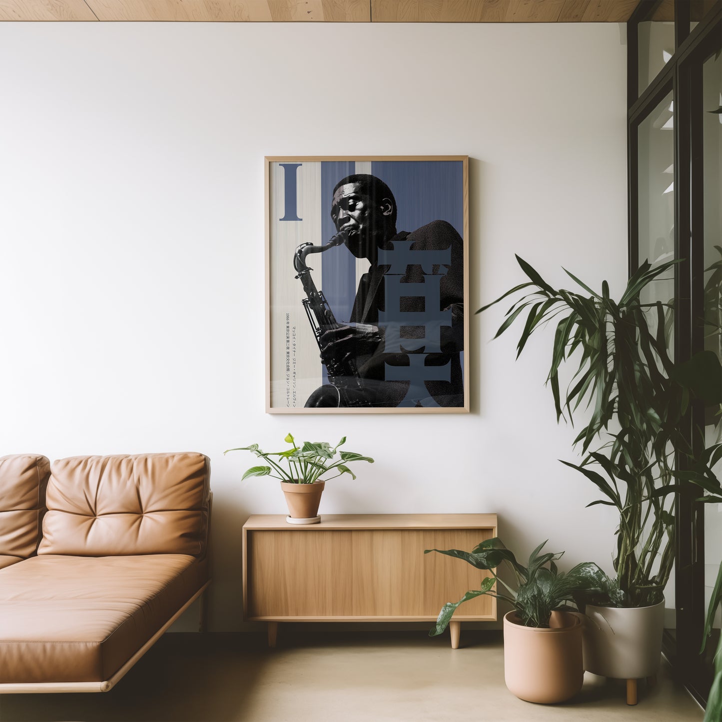 Living room with a beige sofa, wooden cabinet, and framed picture of a musician playing a saxophone.