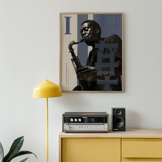 Framed artwork of  saxophonist John Coltrane on a wall above a yellow cabinet with stereo equipment.