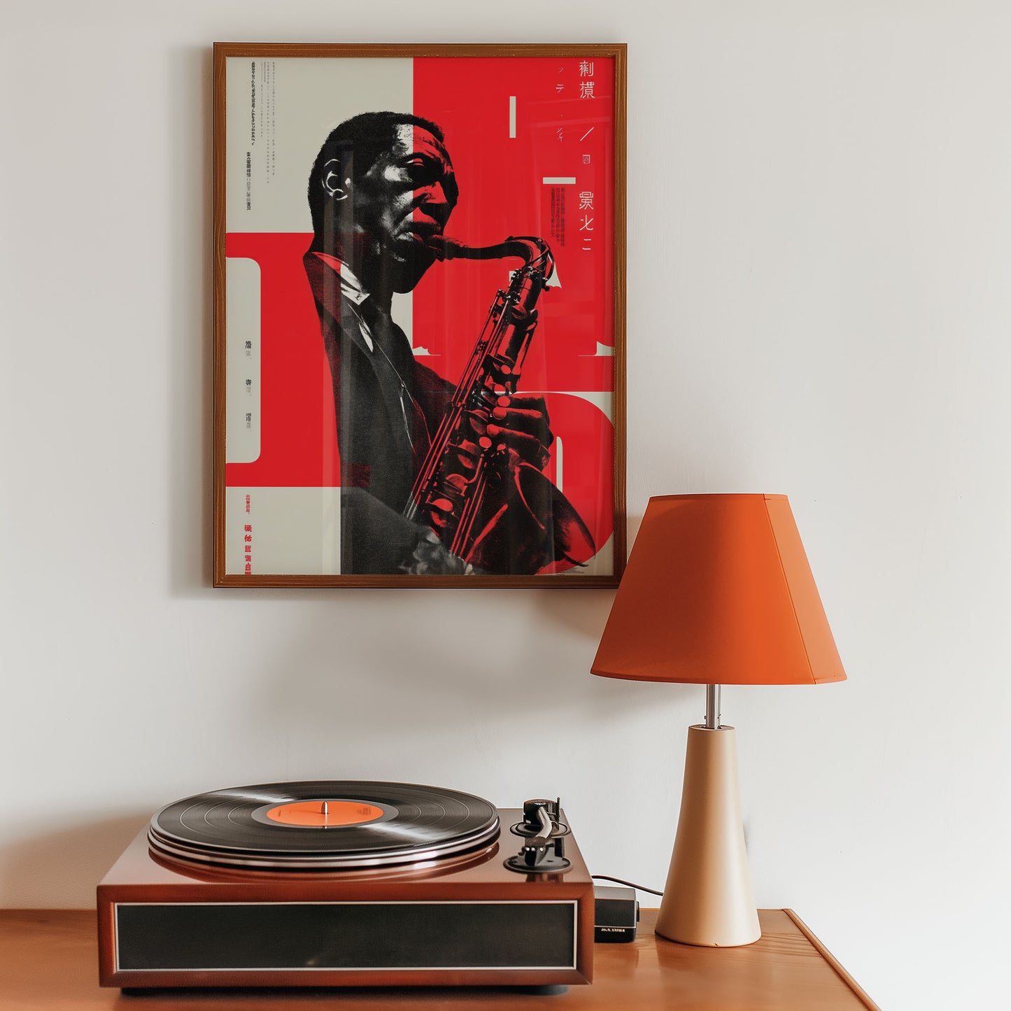 Framed artwork of a musician playing a saxophone on a wall above a record player with an orange lamp.