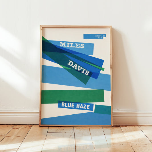 Framed poster of Miles Davis' 'Blue Haze' album cover on a white wall.