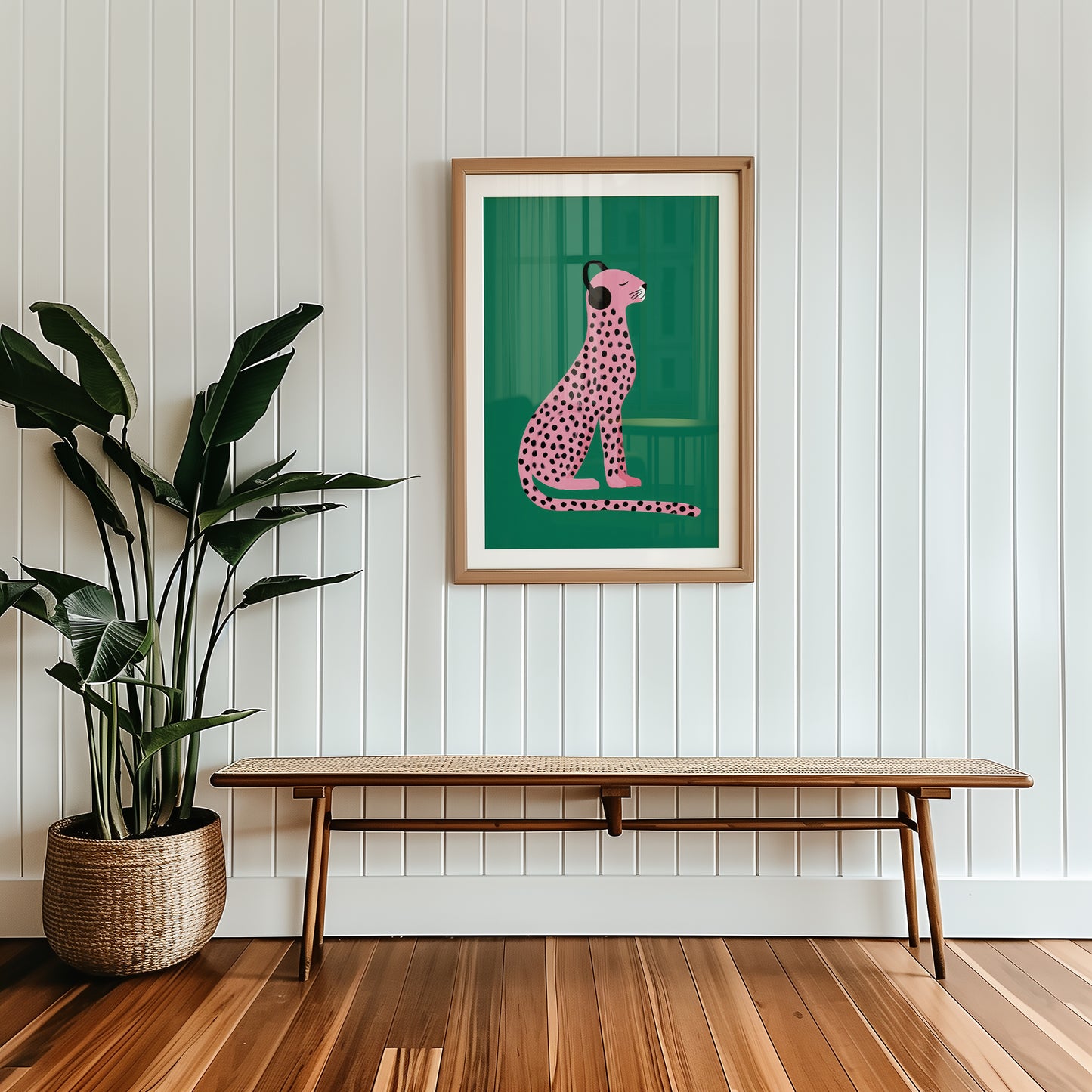 jewel tone wall art of a pink cheetah on a green background in a dopamine decor interior. 