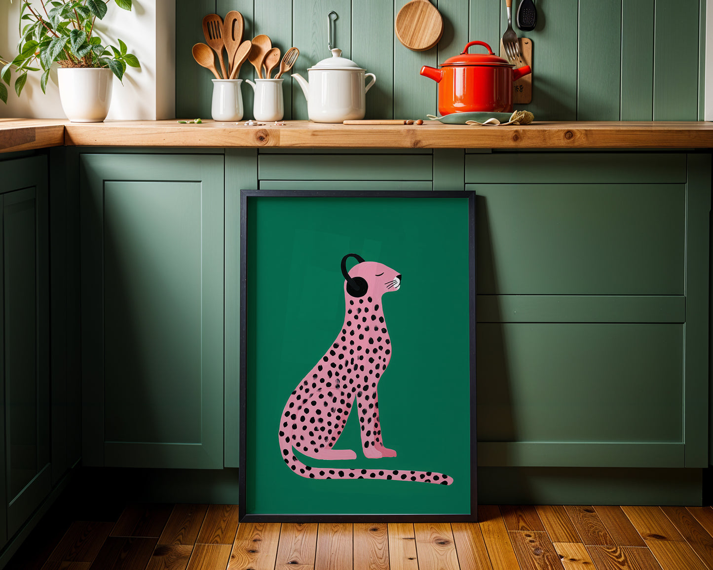 dopamine decor artwork of a pink spotted dog on a green wall in a organic lux kitchen.