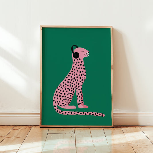 maximalist wall art of a pink cheetah with black spots on a green background, leaning against a white wall.