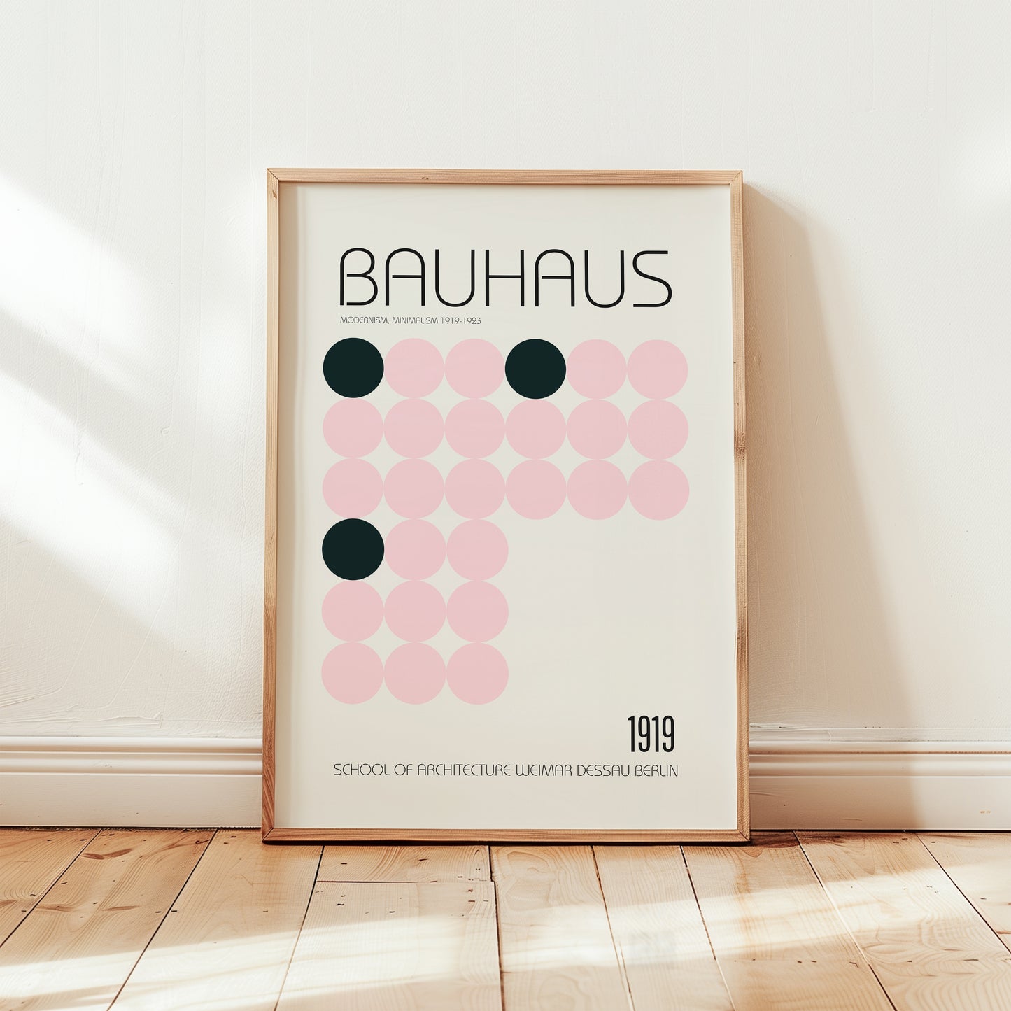 Bauhaus 1919 modernist poster print featuring a grid of soft pink circles with dark green accent dots on a cream background and minimalist typography.