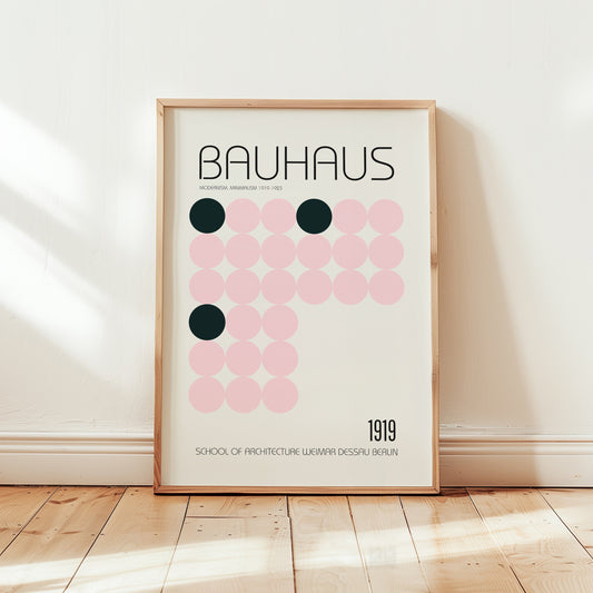 Bauhaus 1919 modernist poster print featuring a grid of soft pink circles with dark green accent dots on a cream background and minimalist typography.