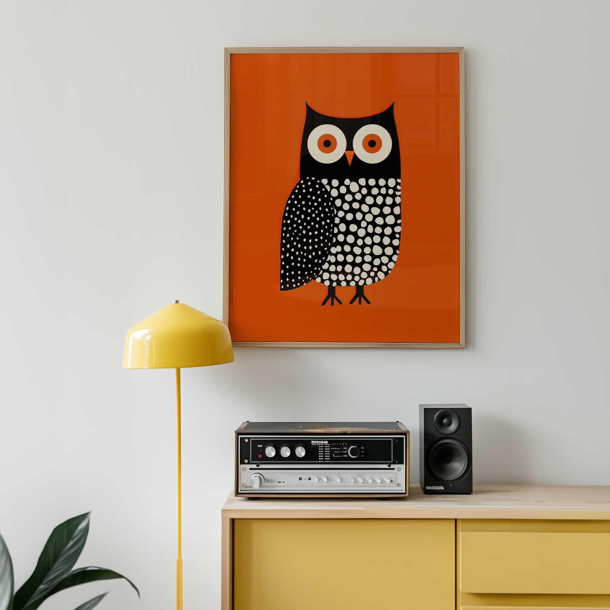 Modern Nordic owl wall art in a cool music room interior.