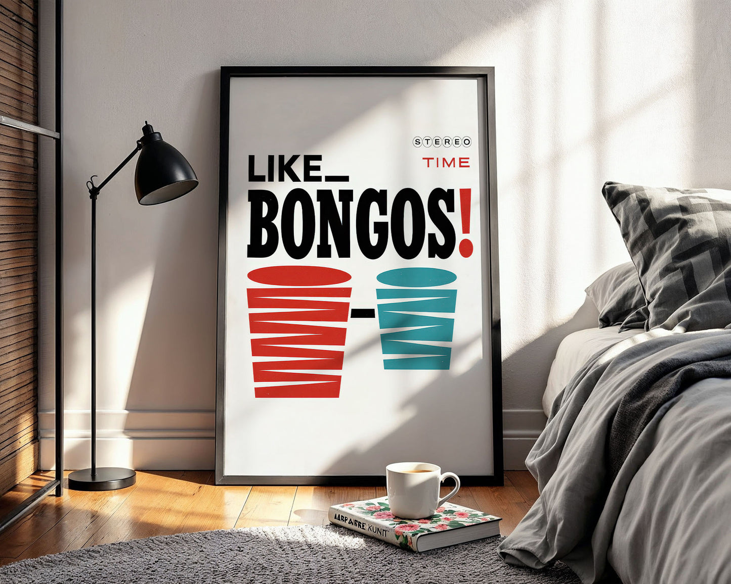 Framed poster with 'LIKE BONGOS!' text in a bedroom setting