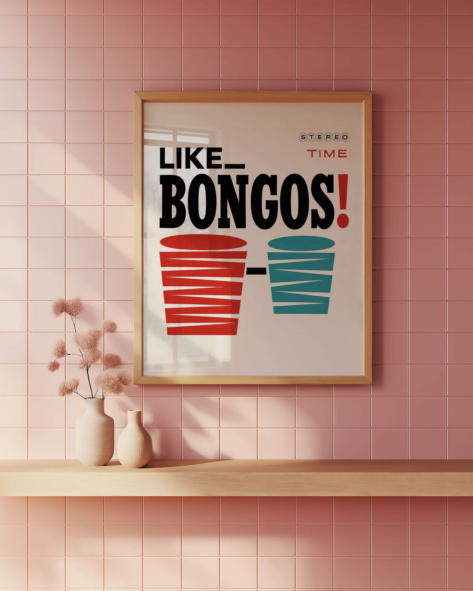 Framed poster with 'LIKE BONGOS!' text and cup illustrations on a pink tiled wall.