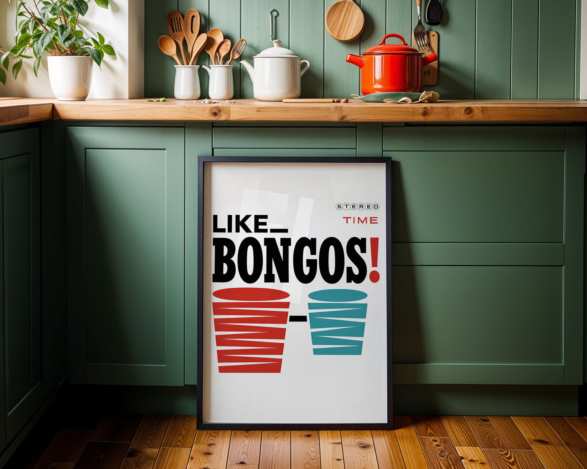 Framed poster with 'LIKE BONGOS!' text in a kitchen setting