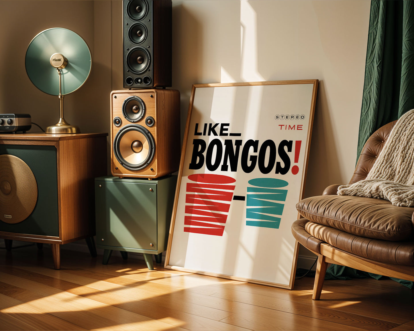 Room interior with speakers, a lamp, and a decorative sign on a wall.