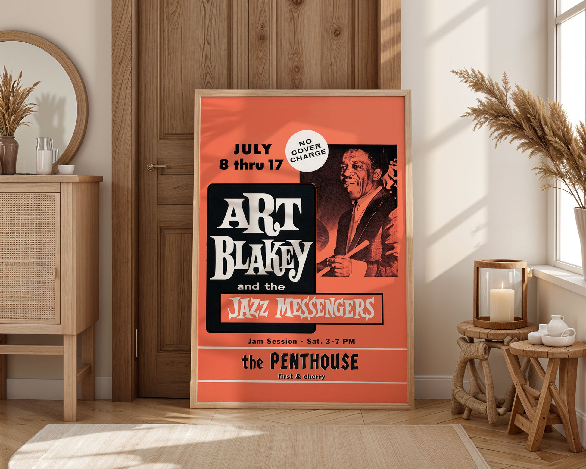 Poster of Art Blakey and the Jazz Messengers displayed in a room with wooden furniture and decor.