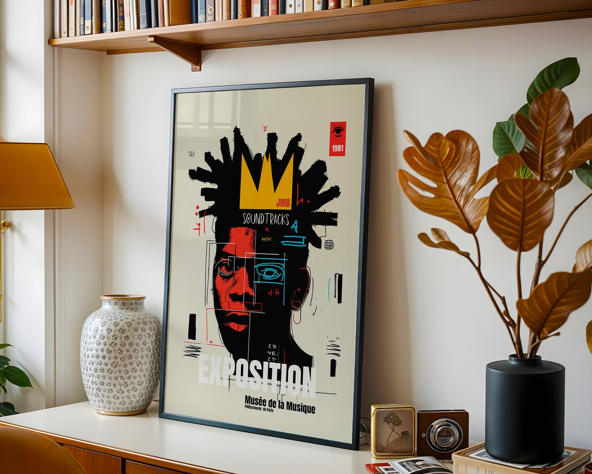 Framed artwork on a wall with decorative elements like a lamp, plant, and vases.