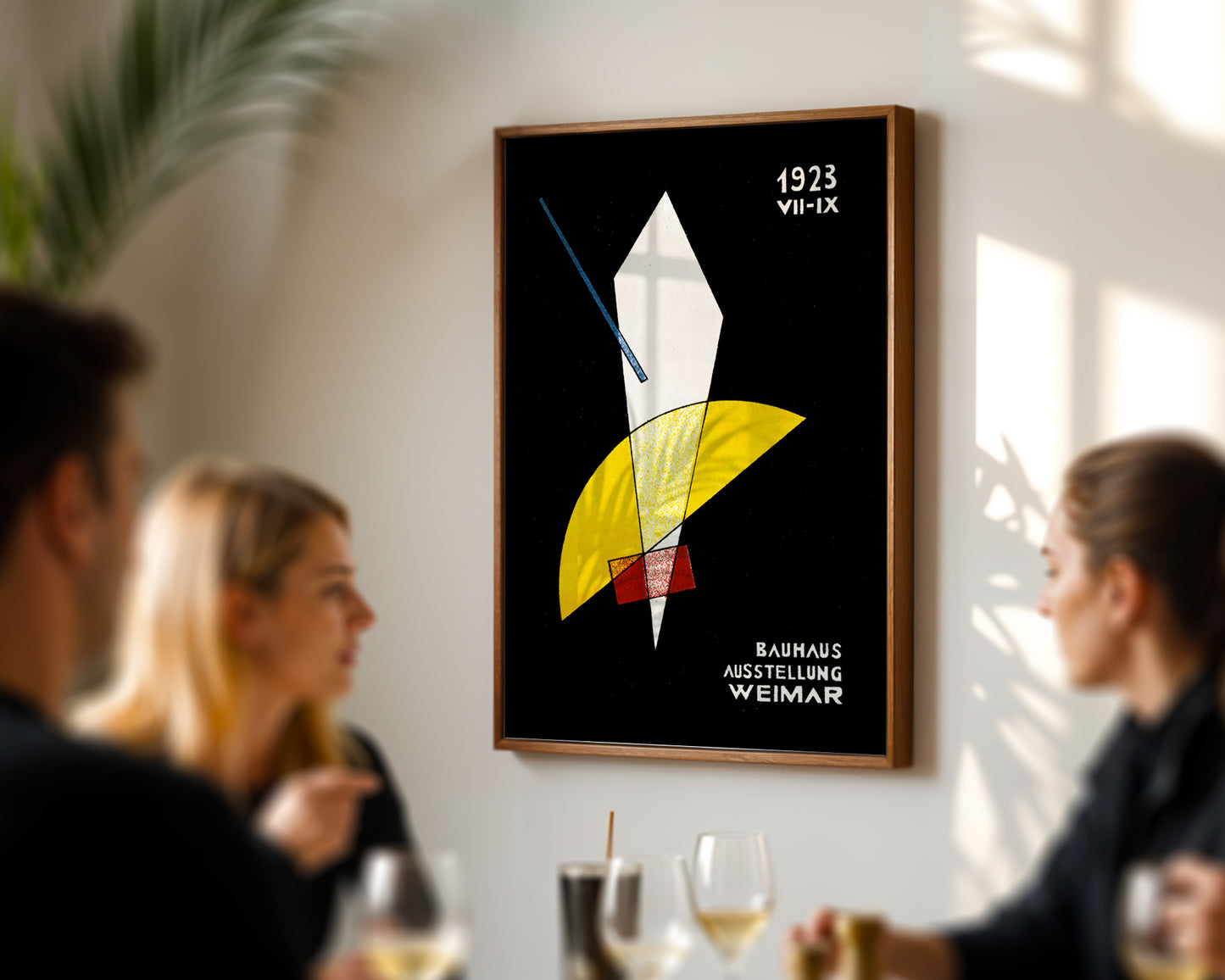 Framed poster with abstract design and text on a wall in a dining area.