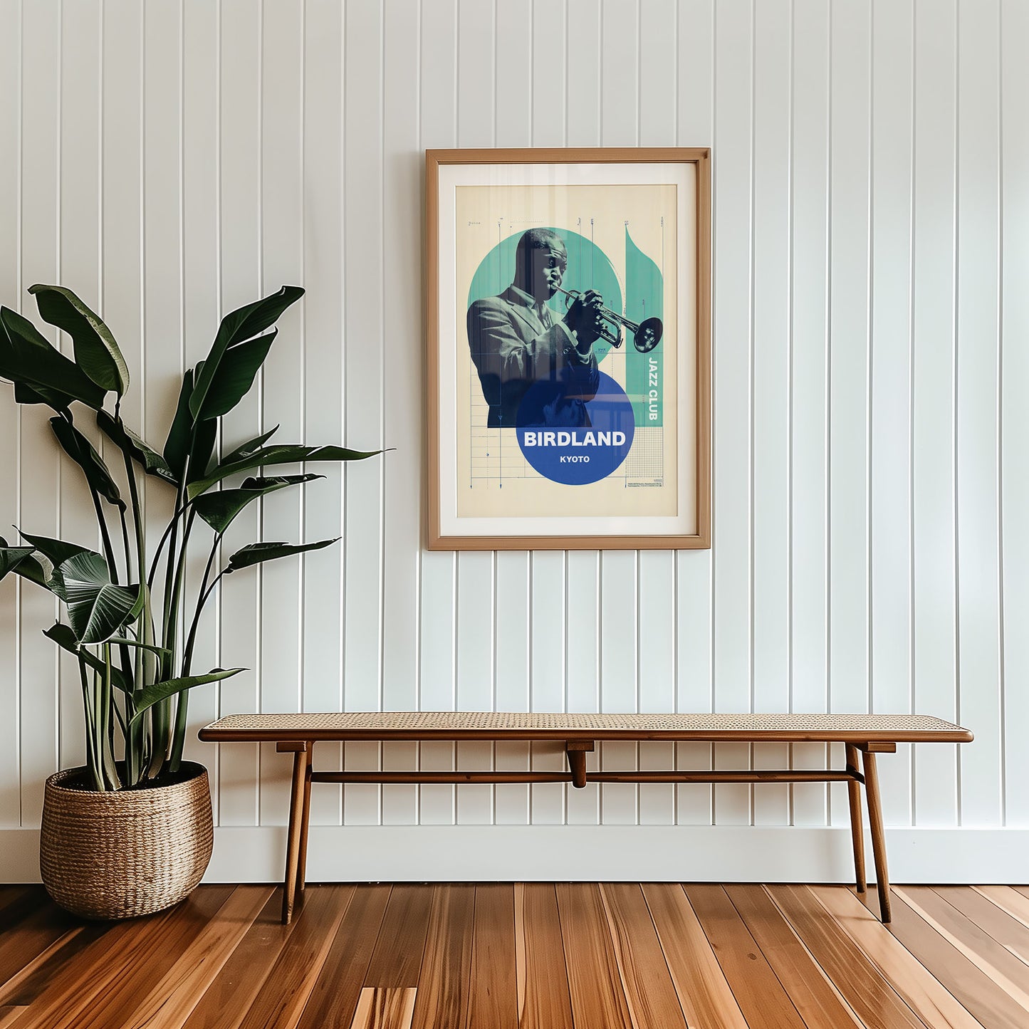Framed poster of a jazz musician on a wall with a plant and bench in the foreground.