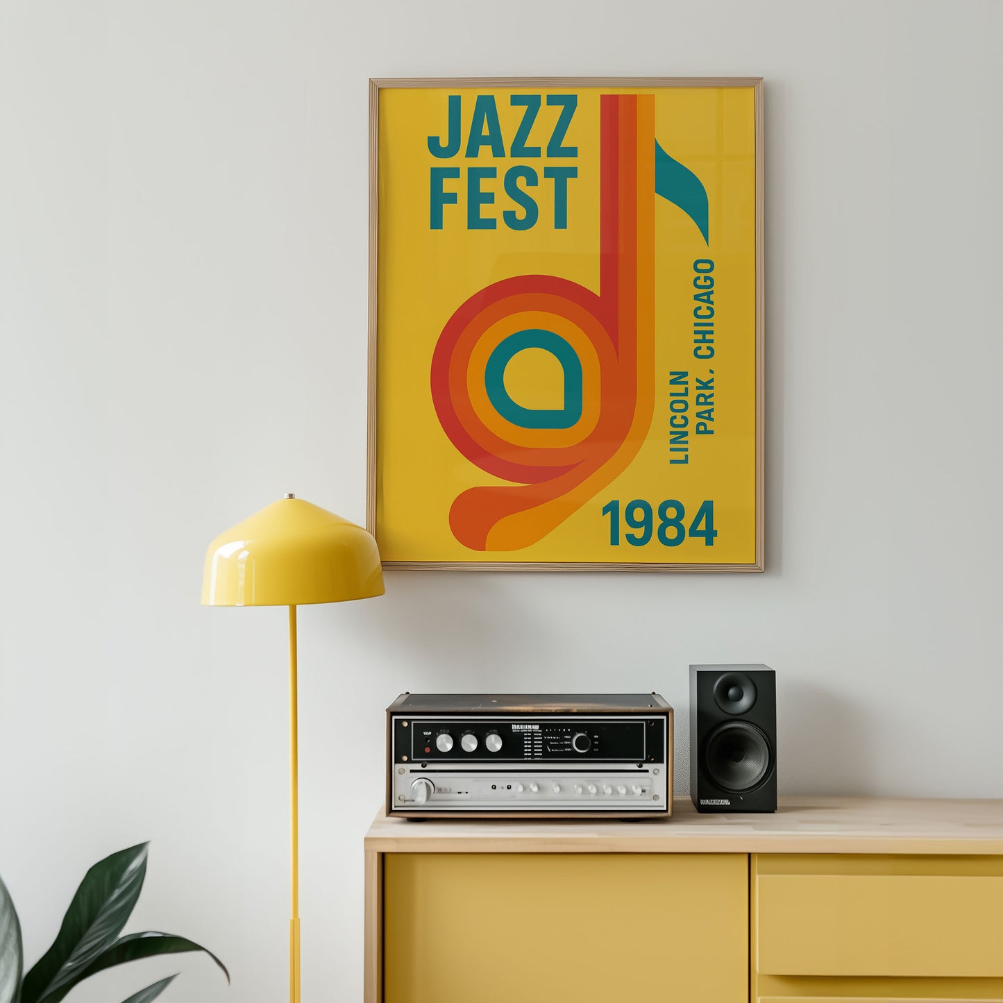 Framed 'Jazz Fest' poster on a wall above a wooden cabinet with audio equipment.