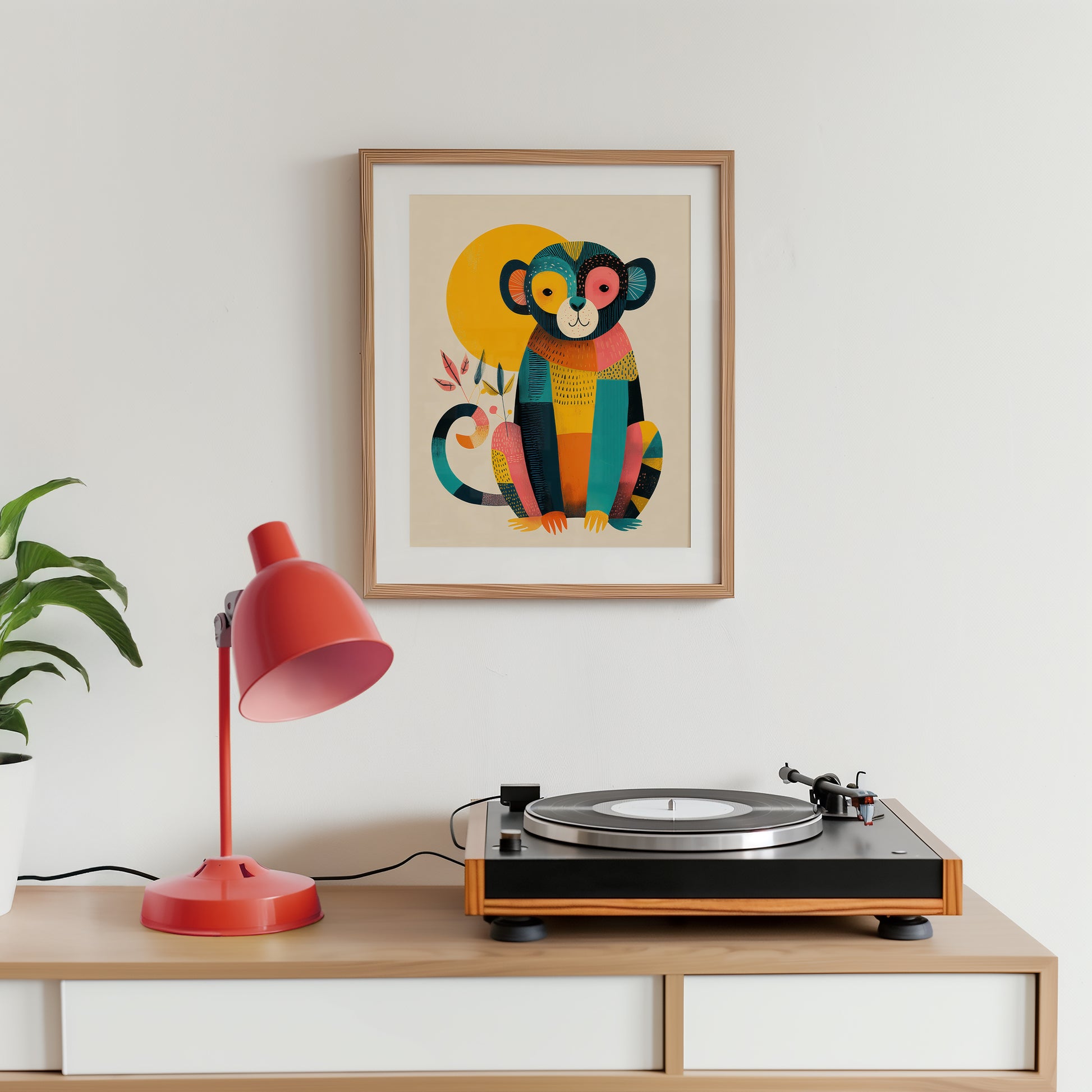 Mid-century inspired art poster styled above a record player in modern home decor setting