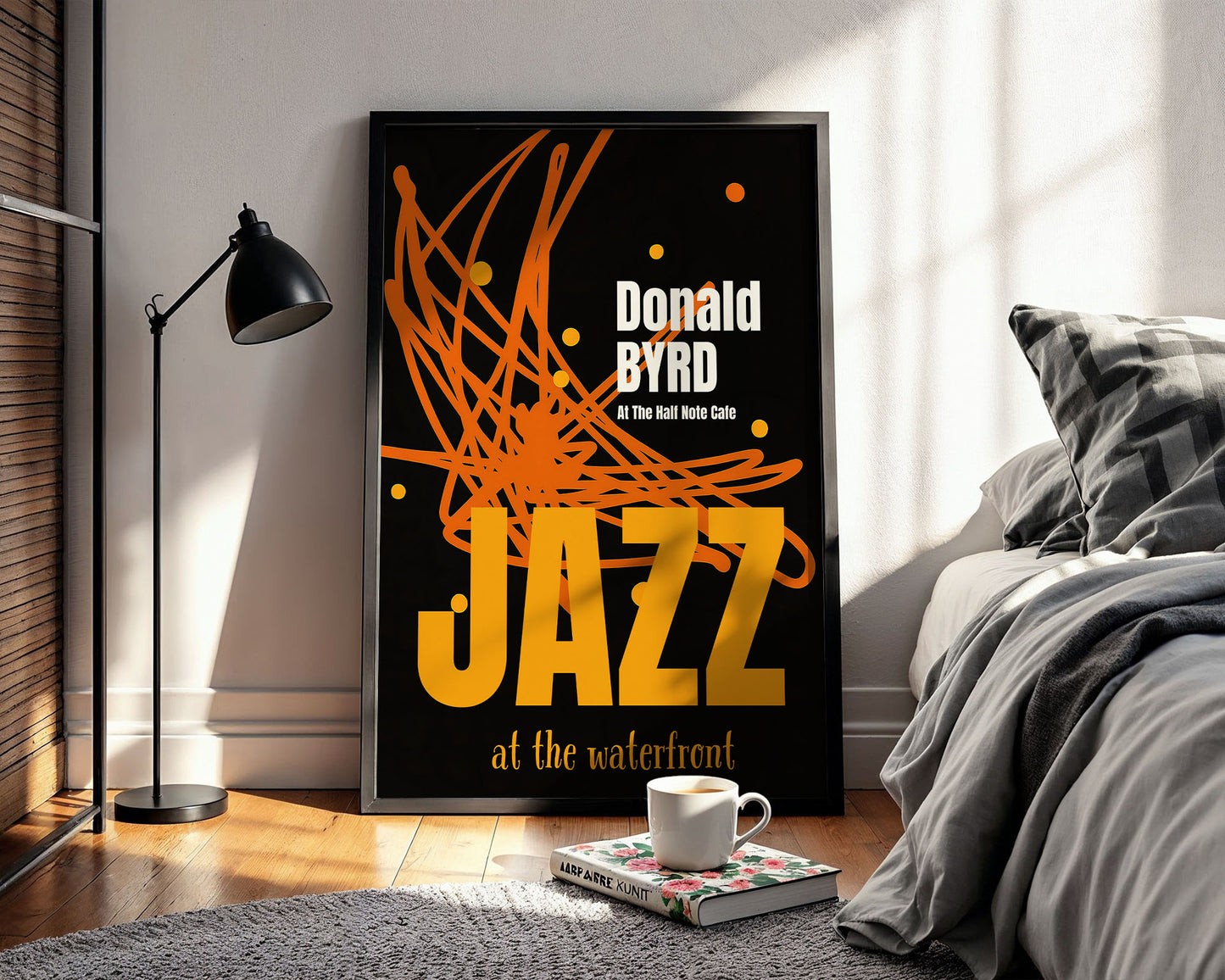 Framed poster of 'Jazz at the waterfront' by Donald Byrd in a bedroom setting.
