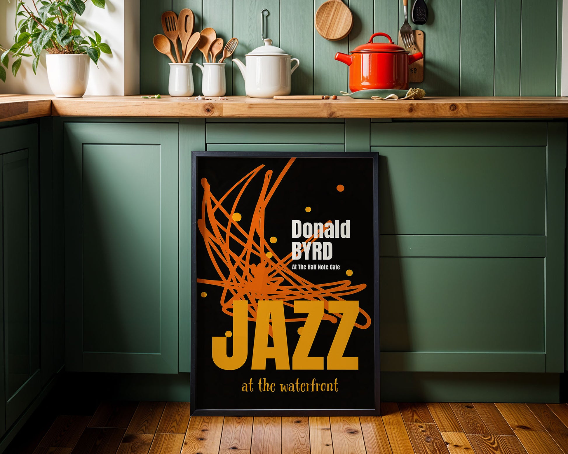 Poster of 'Donald Byrd Jazz at the waterfront' in a kitchen setting with green cabinets and wooden countertops.