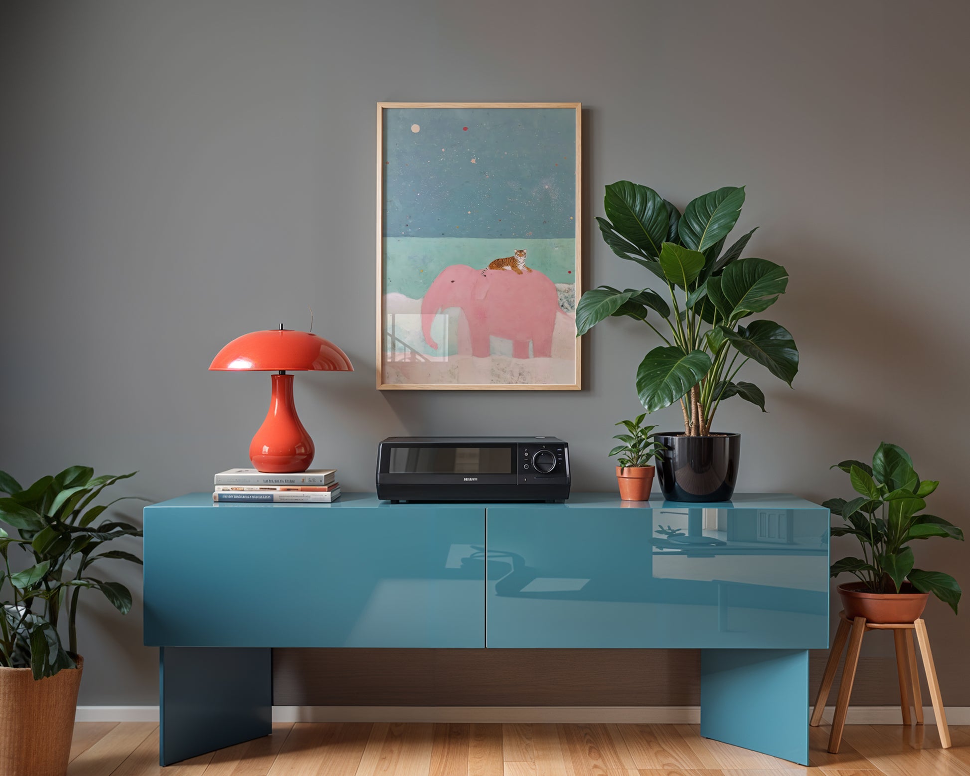 Framed art print of pink elephant and tiger in scandi style music room, with houseplants and a blue sideboard. 