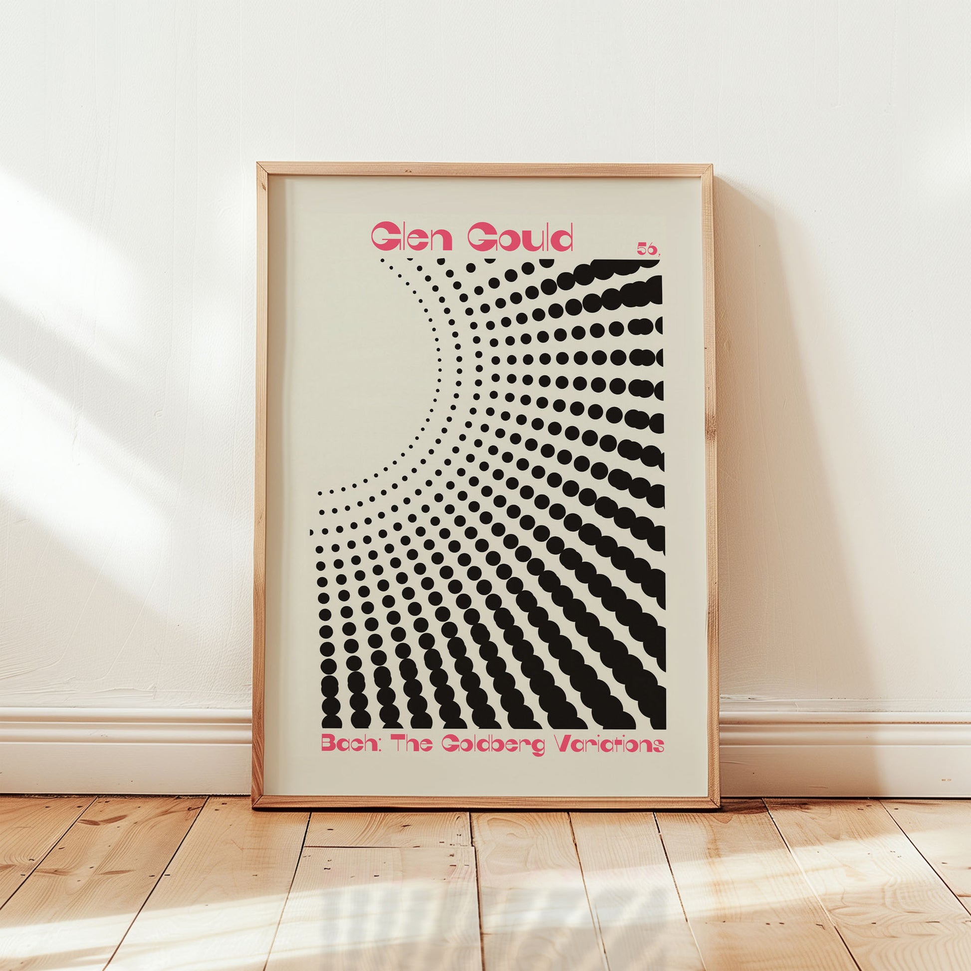 Mid-century inspired art poster styled above sofa in modern home decor setting