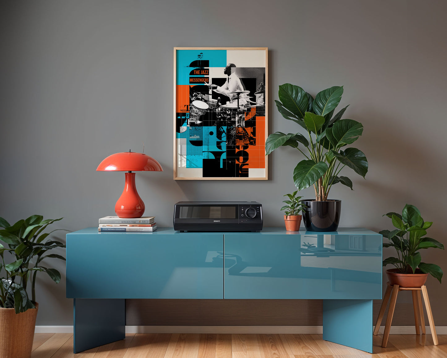 bold colour print in a  living room with a blue console table, red lamp, and framed artwork on a gray wall.
