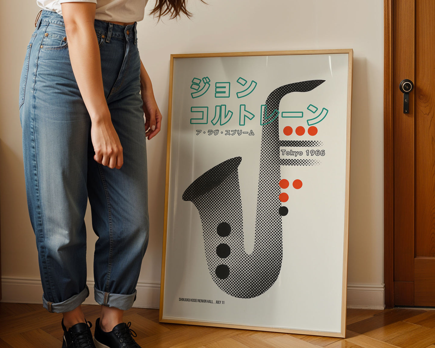 Framed mid-century style wall art print styled against minimalist interior wall