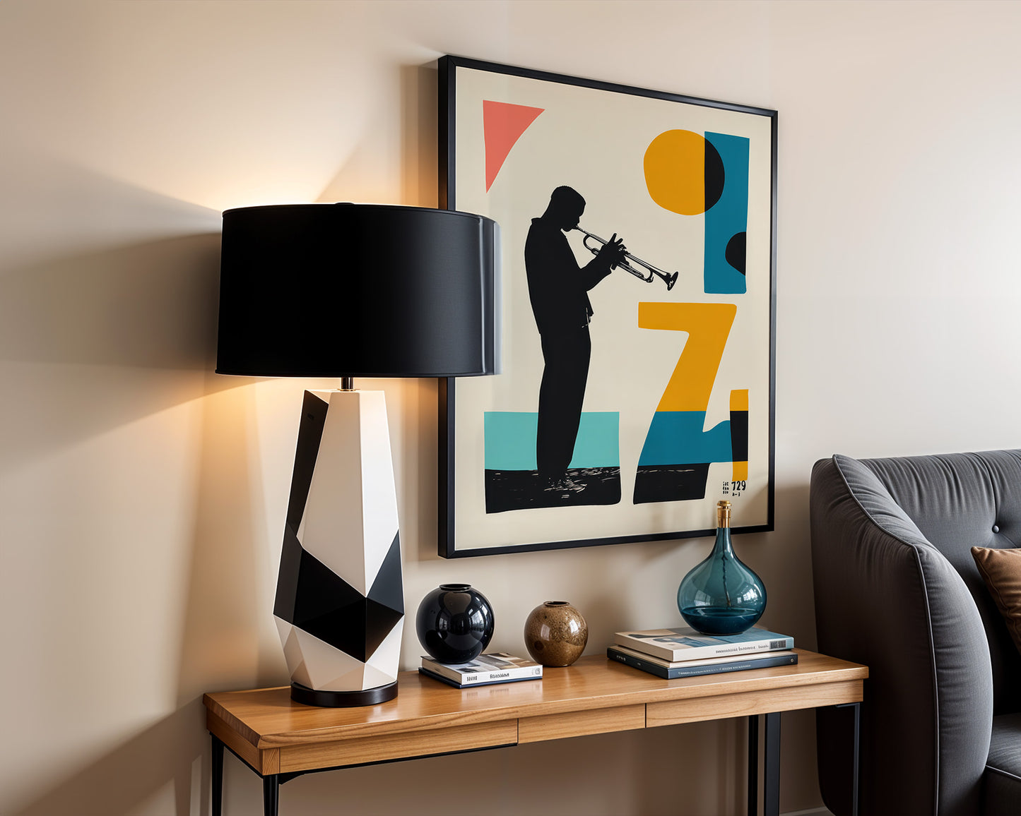 Modern interior with a lamp, framed vintage style jazz print , and decorative items on a wooden console table.
