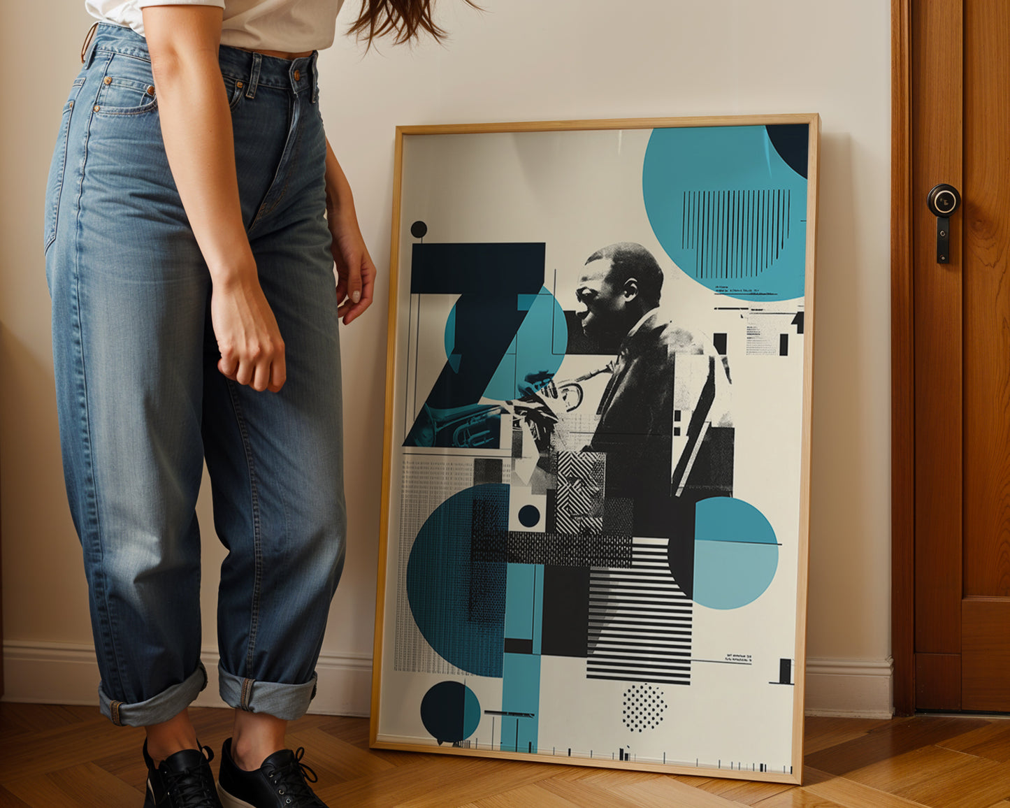 Person standing next to a framed  dark academia abstract art piece on a wall.