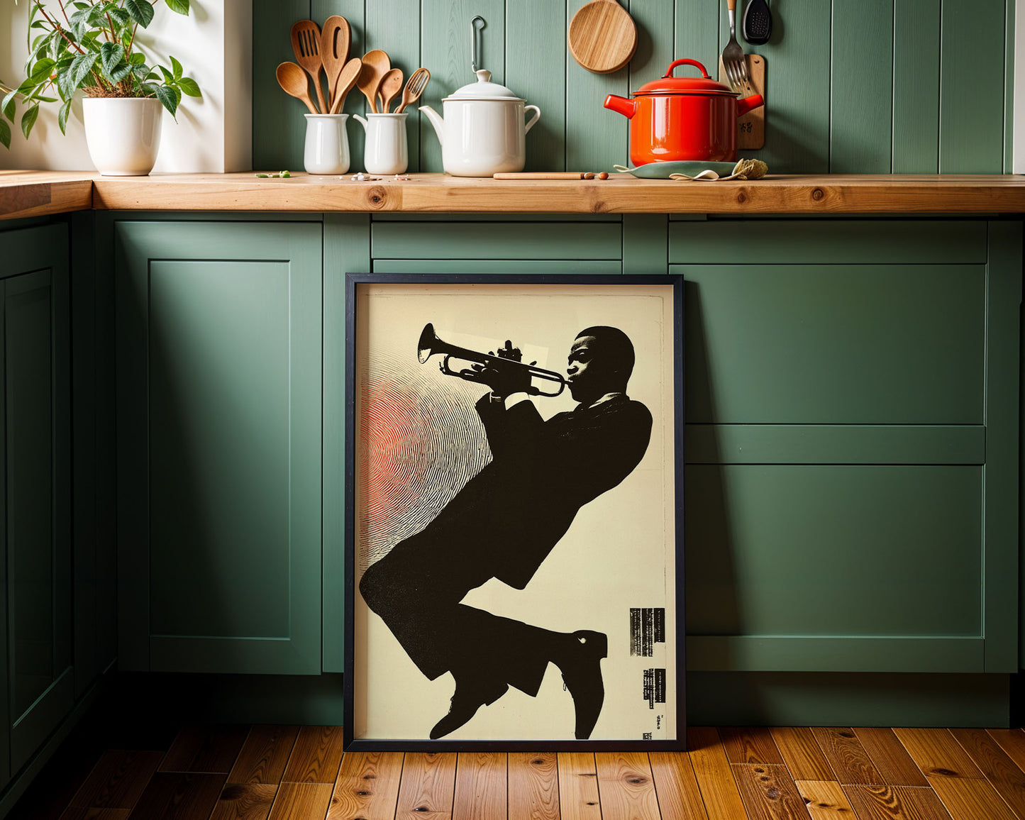 Framed artwork of a silhouette playing a trumpet in a kitchen setting.