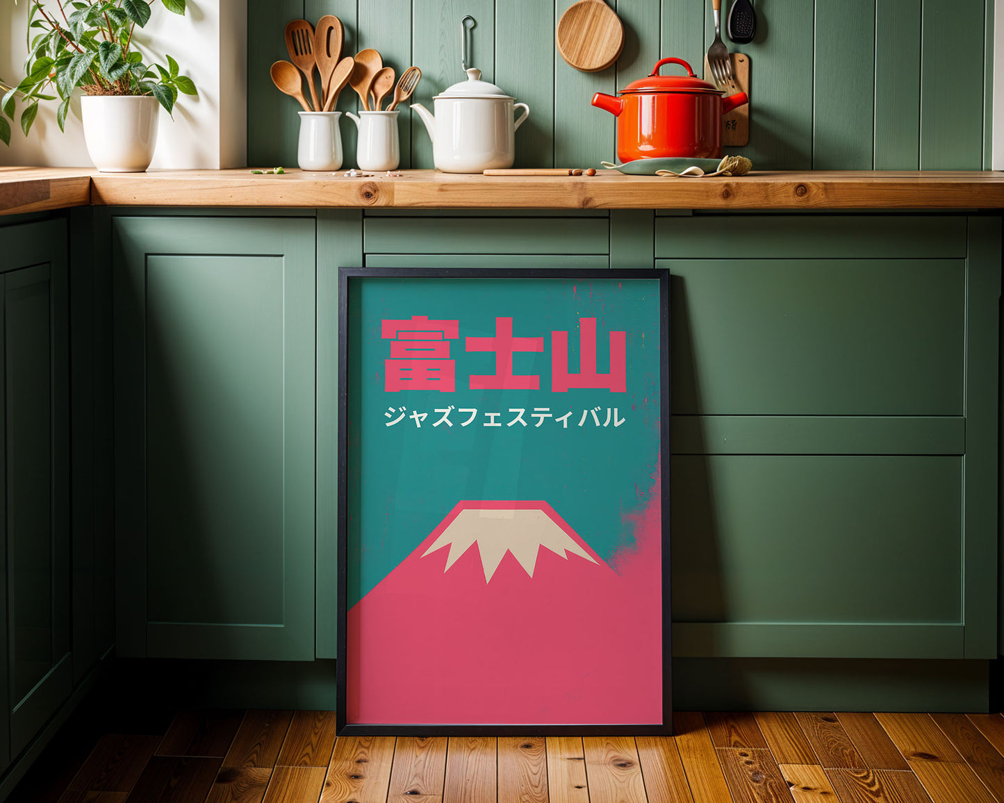 Framed artwork with a mountain design and Japanese text in a kitchen setting