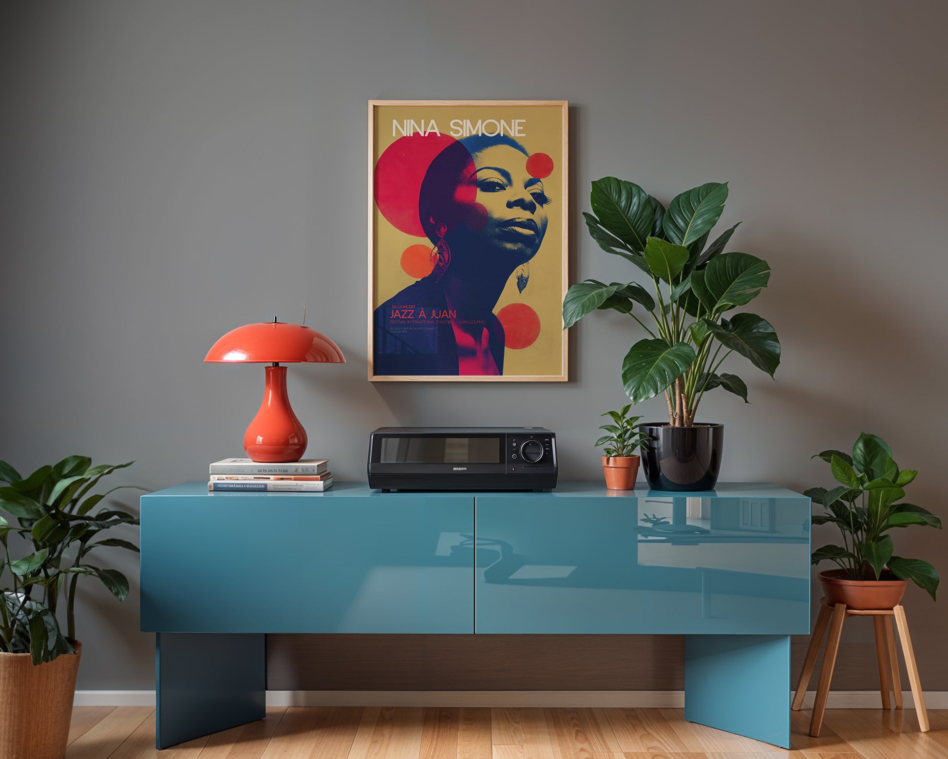 Modern interior with a blue console table, red lamp, and framed jazz 
poster on a gray wall.