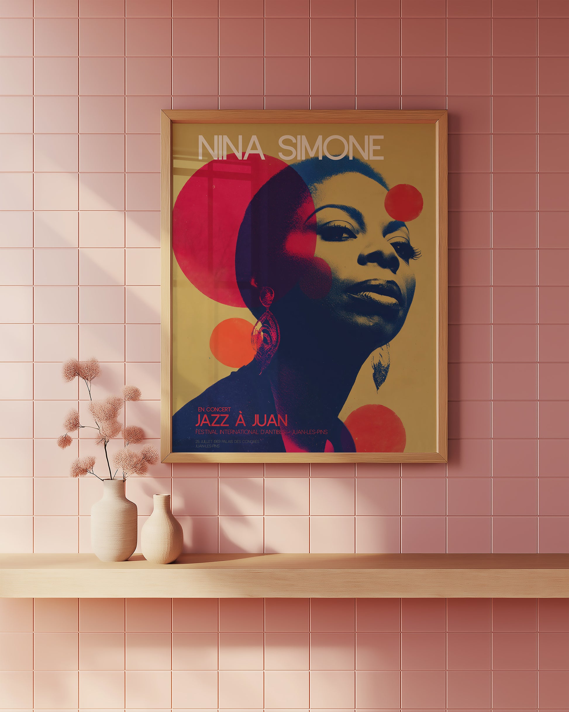 Framed poster of Nina Simone on a pink tiled wall mid-century Bathroom 
